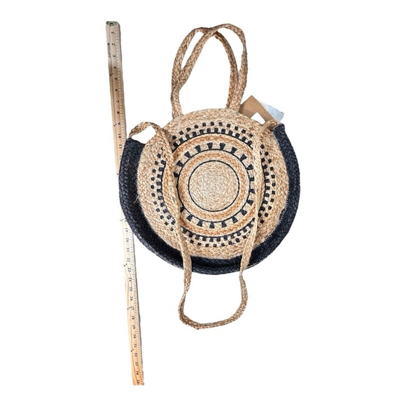 The Shanty Moroccan Round Crossbody Woven Jute Straw Beach Bag in Natural - Picture 9 of 11